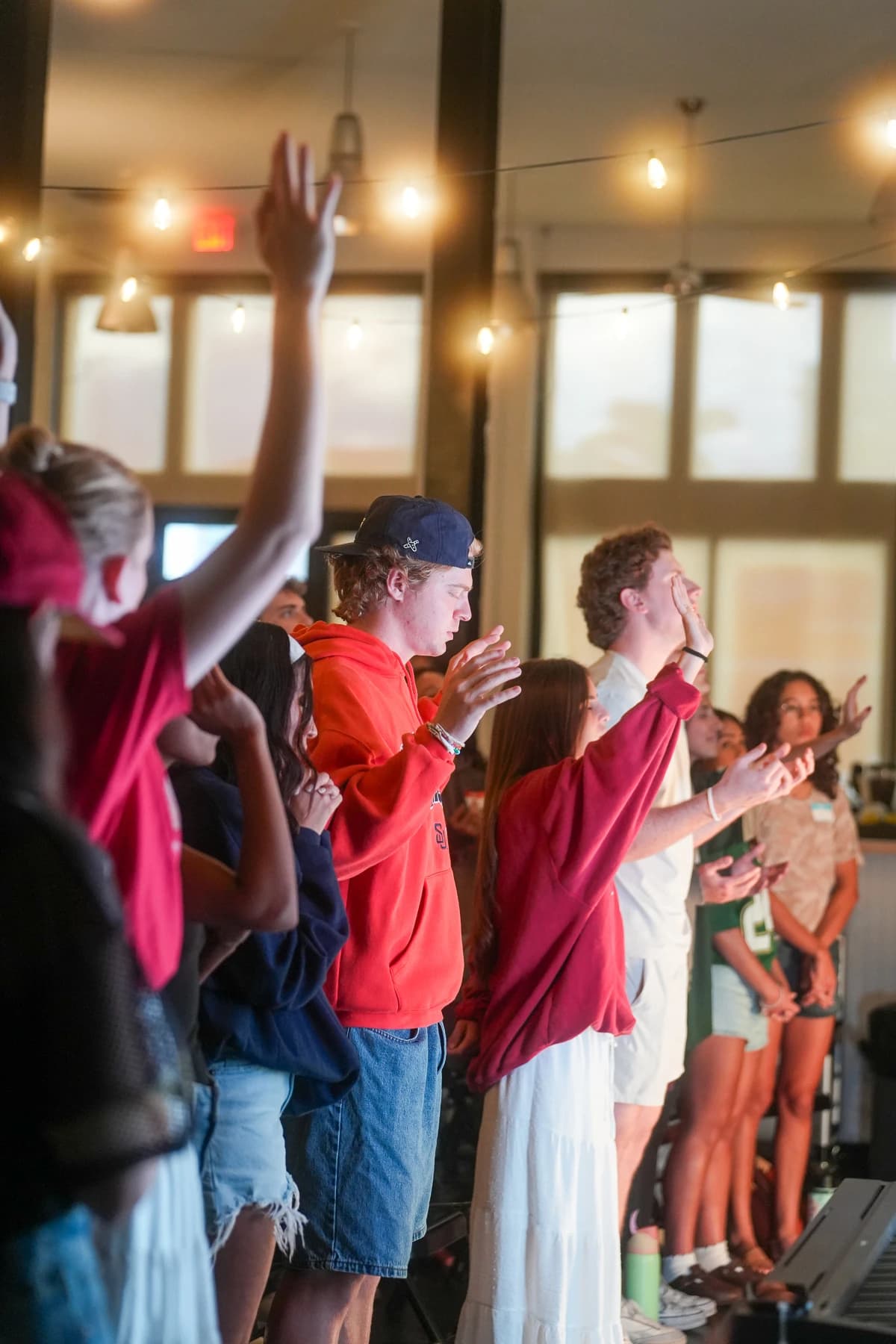 Young adults in prayer